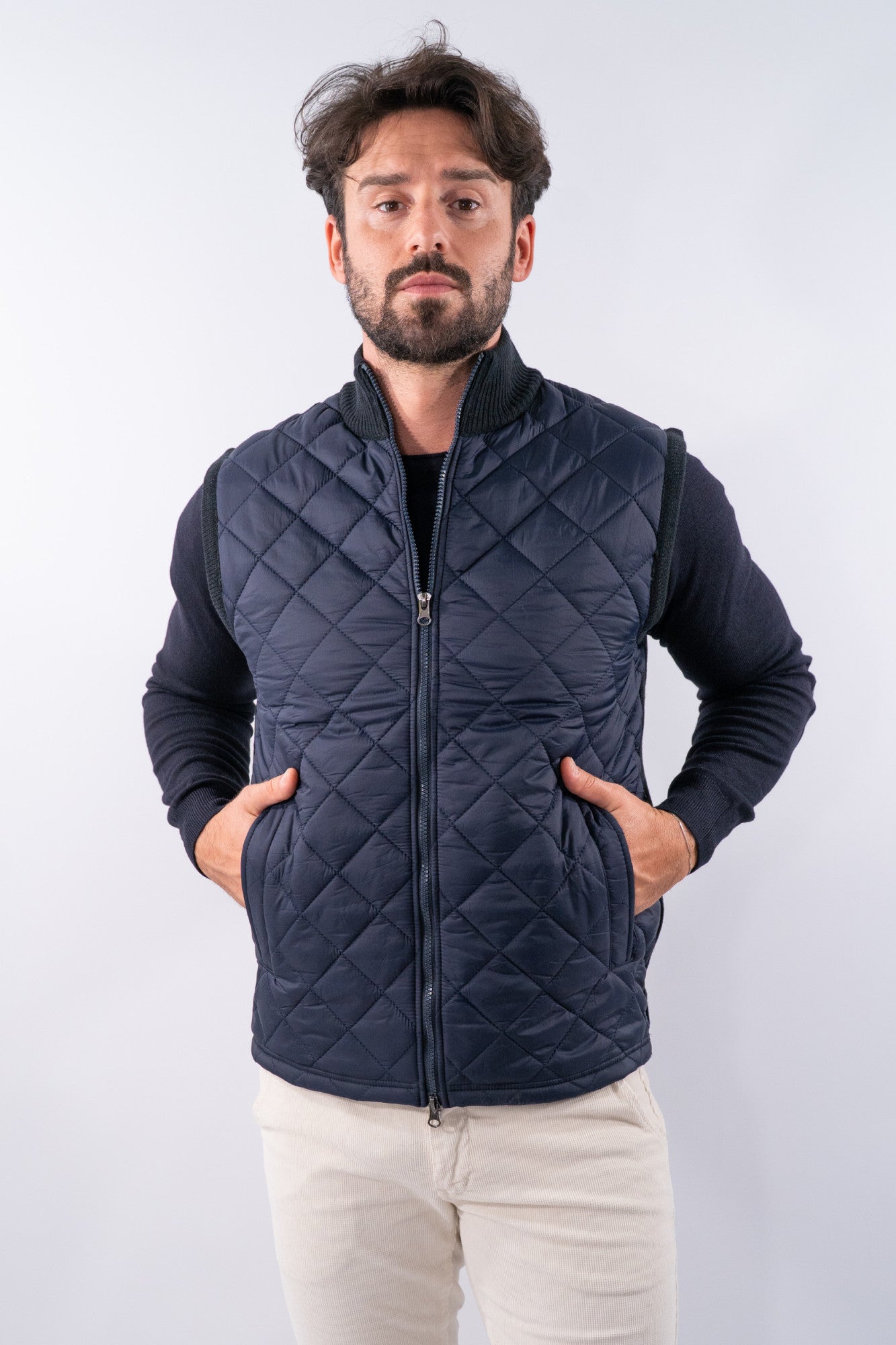 Gilet trapuntato con collo in maglia a coste